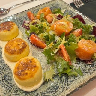 Savory syrniki on truffle cream cheese with salmon