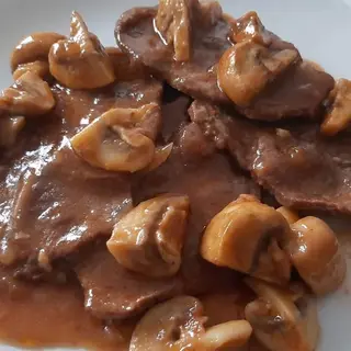 Ternera Con Champiñones