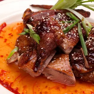 Pato Con Salsa Picante
