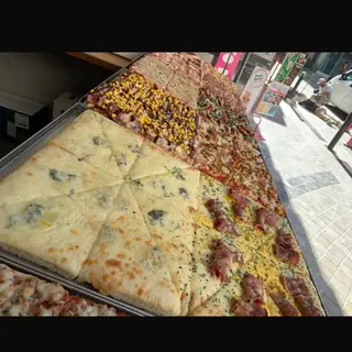 Porción pizza gorgonzola 