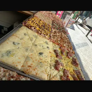 Porción pizza verduras a la brasa