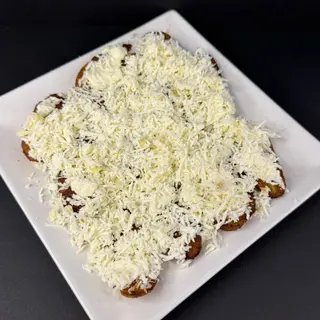Tajadas Con Queso Rallado