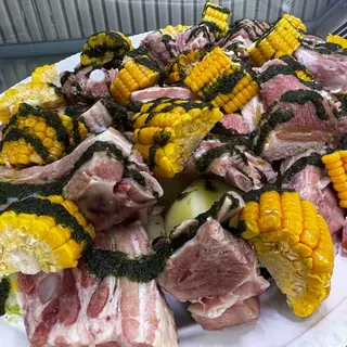 Costillas Con Papas Y Piñas