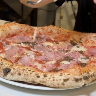 Pizza prosciutto e funghi