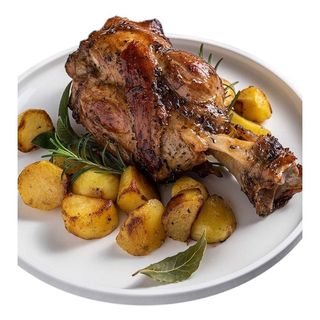 Stinco di maiale alla brace con patate forno 