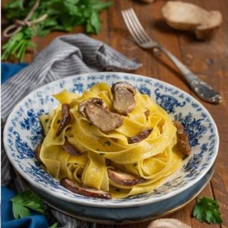 Fettuccine con porcini e grana