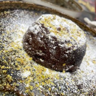 Tortino cioccolato fondente con cuore caldo al pistacchio