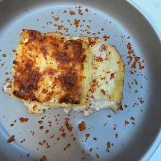 Parmigiana di melanzane ai frutti di mare