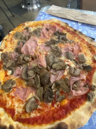 Prosciutto e funghi