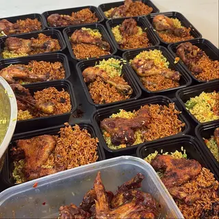 Jollof rice and fried rice combo with chicken