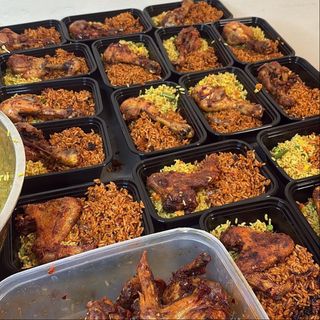 Jollof rice and fried rice combo with chicken