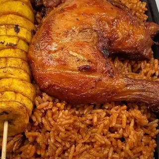 Jollof rice and chicken with plantain