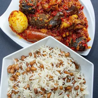 Rice and beans with ponmo, Fish and egg