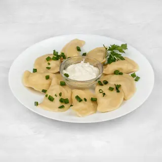 Pierogi z kapustą i pieczarkami