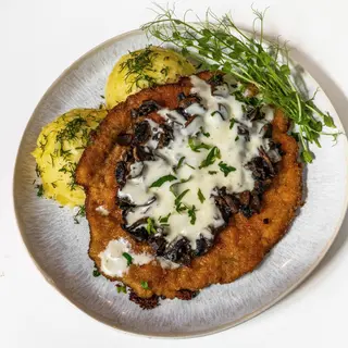 Schabowy z mozzarellą i pieczarkami
