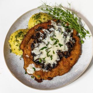 Schabowy z mozzarellą i pieczarkami