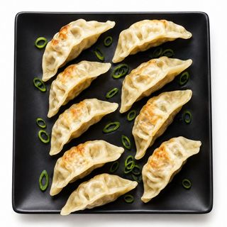 S29. Gyozas de Frango 8 Peças